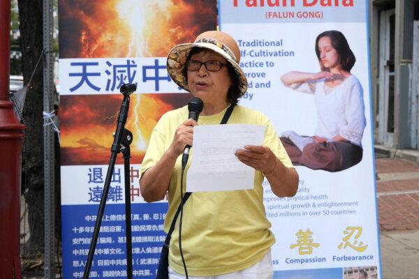 Ms. Yang Jingfang speaks at a rally in Philadelphia Chinatown on July 20, 2025. (Andy H. Li/The Epoch Times)