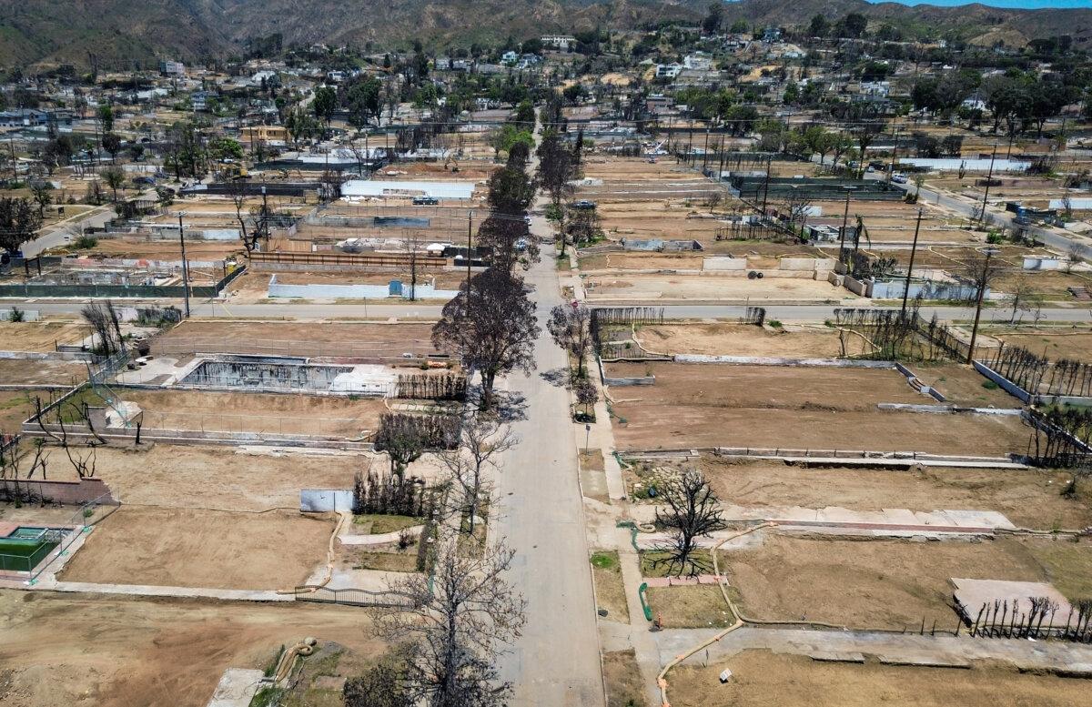 The property lines of homes burned during the Palisades Fire are visible in the Pacific Palisades neighborhood of Los Angeles, on June 9, 2025. (John Fredricks/The Epoch Times)