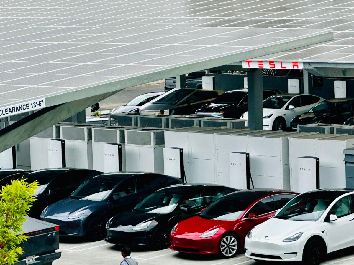 Teslas fill the charging stations at the new Tesla Diner in Los Angeles on July 22, 2025. (Jill McLaughlin/The Epoch Times)