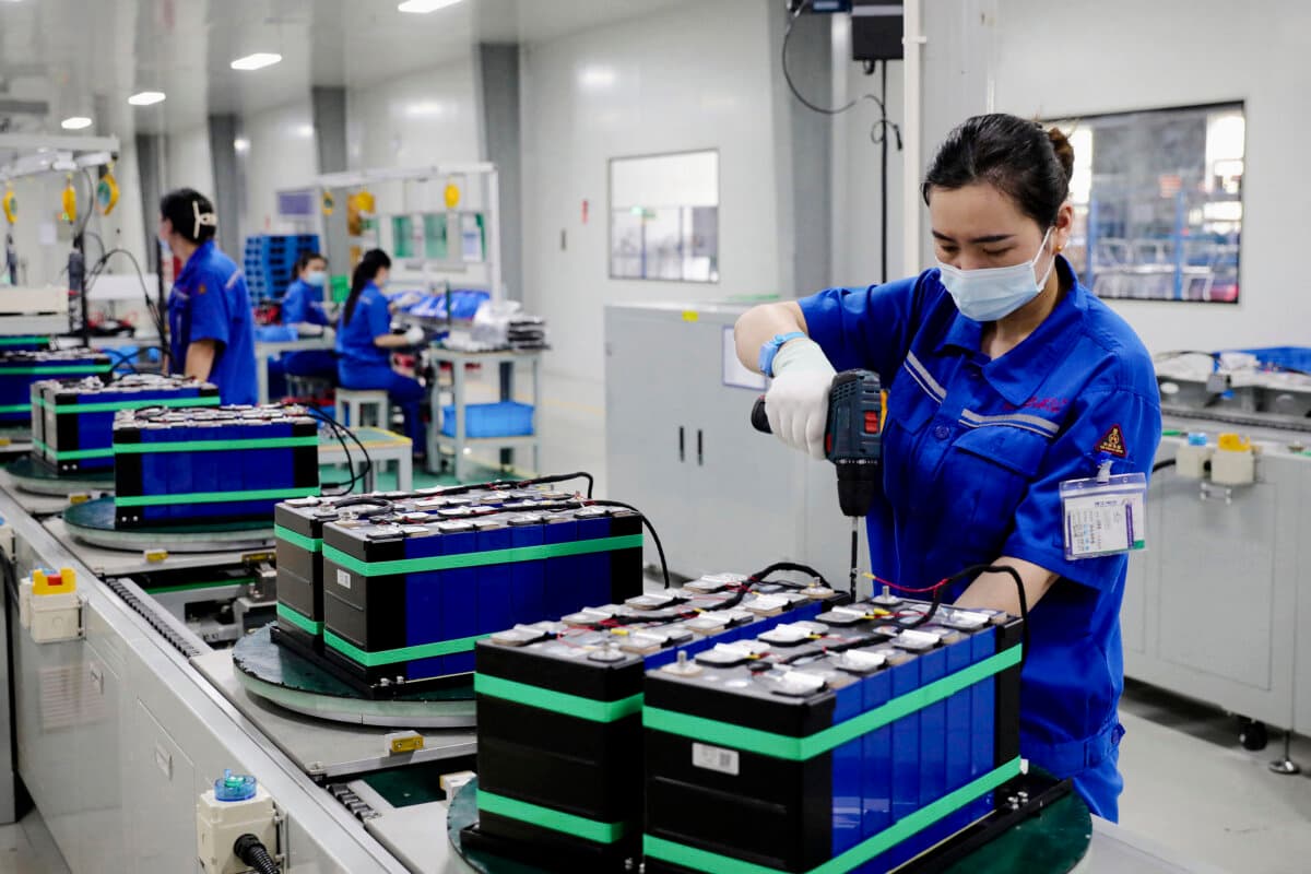 Employees working at a factory that produces lithium batteries for export in Huaibei, Anhui Province, China, on June 11, 2024. (STR/AFP via Getty Images)