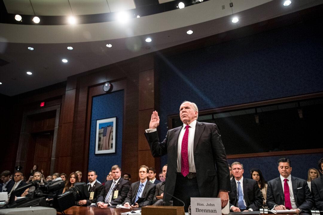 Former CIA Director John Brennan is sworn in before a House Intelligence Committee hearing on Capitol Hill in Washington on May 23, 2017. Brennan testified that the Steele dossier “was not in any way used as a basis for the Intelligence Community Assessment that was done.” (Drew Angerer/Getty Images)