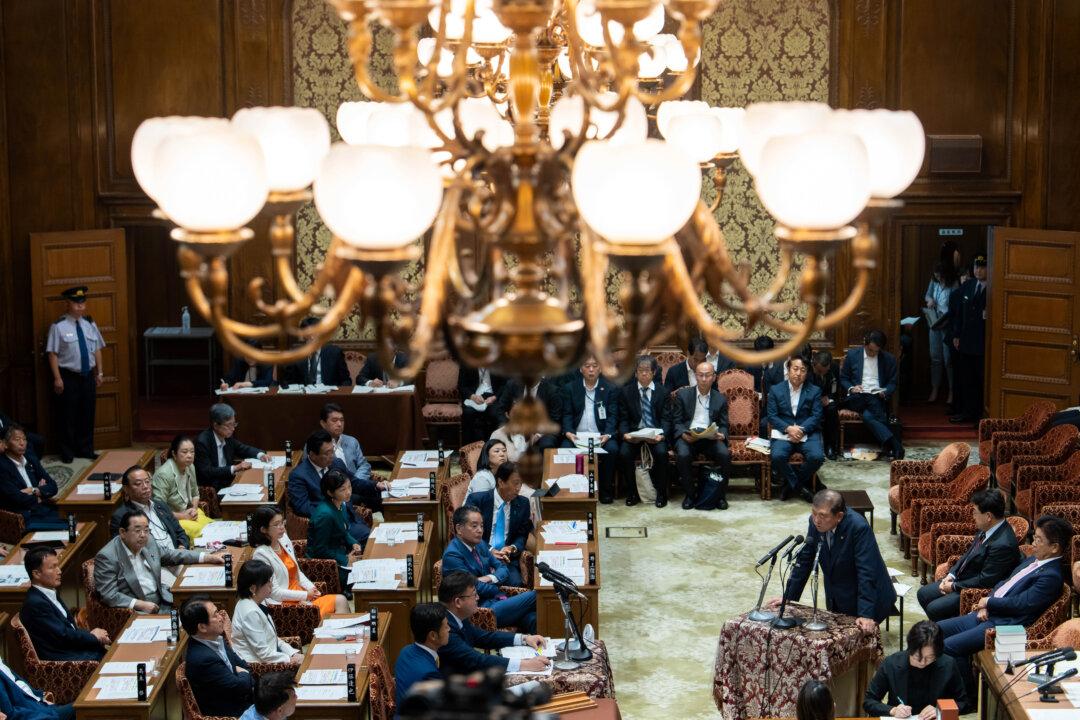 Japanese Prime Minister Shigeru Ishiba attends a budget committee meeting during an extraordinary session at the Upper House of the Diet in Tokyo, Japan, on Aug. 4, 2025. Ishiba pledged to remain in his role as he faces strong pressure to resign, after his ruling Liberal Democratic Party and its coalition partner Komeito lost their majority in the Upper House in last month's election. (Tomohiro Ohsumi/Getty Images)