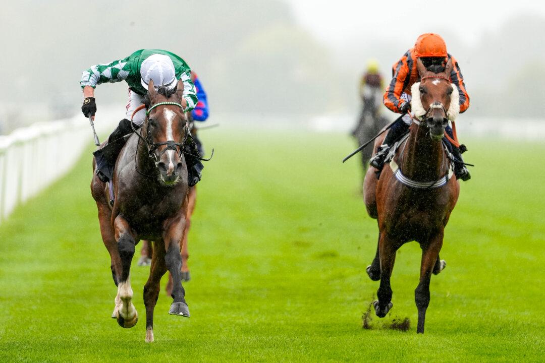 Tom Marquand riding Sir William (green) wins The Vegas Racenight Coming to Windsor Handicap at Windsor Racecourse in Windsor, England, on Aug. 4, 2025. (Alan Crowhurst/Getty Images)