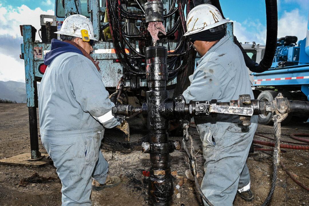 A crew plugs one of a total of 56 abandoned oil wells at the Placerita Oil Field in Santa Clarita, Calif., on Feb. 22, 2022. The state has spent millions of dollars since the late 1970s to plug some of them. Nationwide, the federal government has spent $4.7 billion to plug and reclaim abandoned wells. (Robyn Beck/AFP via Getty Images)