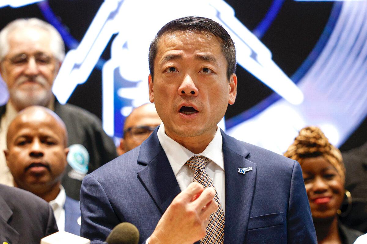 Texas Rep. Gene Wu speaks in front of Democratic members of Congress and Texas House Democrats during a news conference, after they left their state to deny Republicans the quorum needed to redraw the state's 38 congressional districts, at IBEW Local Union 701 in Warrenville, Ill., on Aug. 4, 2025. (Kamil Krzaczynski/AFP via Getty Images)