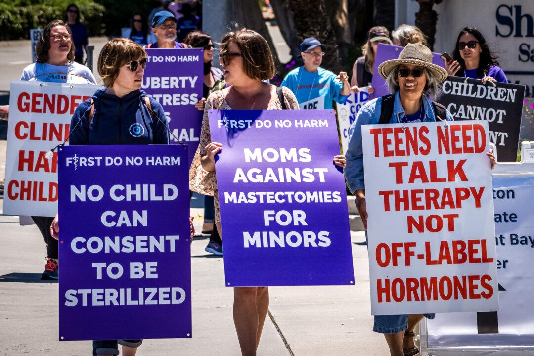 Detransition advocates protest outside the annual Pediatric Endocrine Society conference in San Diego on May 6, 2023. Testimony from medical ethicists, whistleblowers, and detransitioners led the Federal Trade Commission to launch a public inquiry in July into whether consumers—especially minors—have been harmed by transgender-related interventions. (John Fredricks/The Epoch Times)