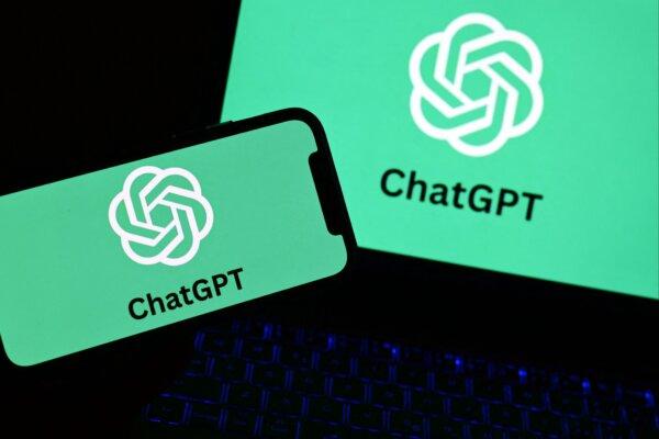 A smartphone and a laptop display the logo of the ChatGPT robot in Manta, Italy, on Oct. 4, 2023. (Marco Bertorello/AFP via Getty Images)