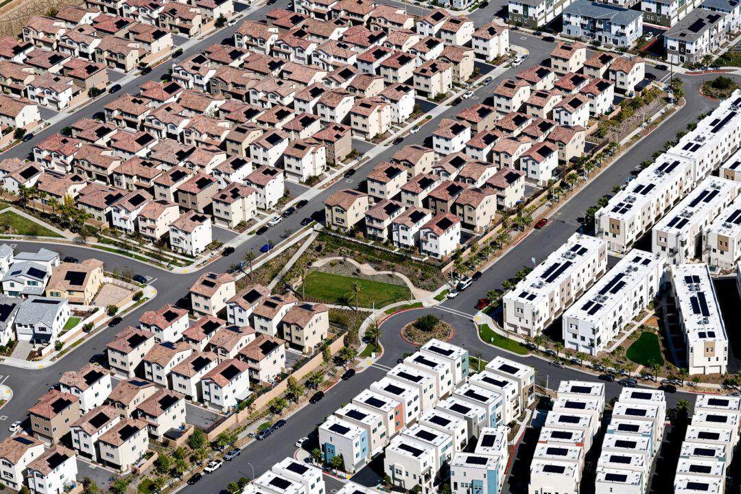 An aerial view of residential housing with solar panels in Los Angeles on April 3, 2025. (Mario Tama/Getty Images)
