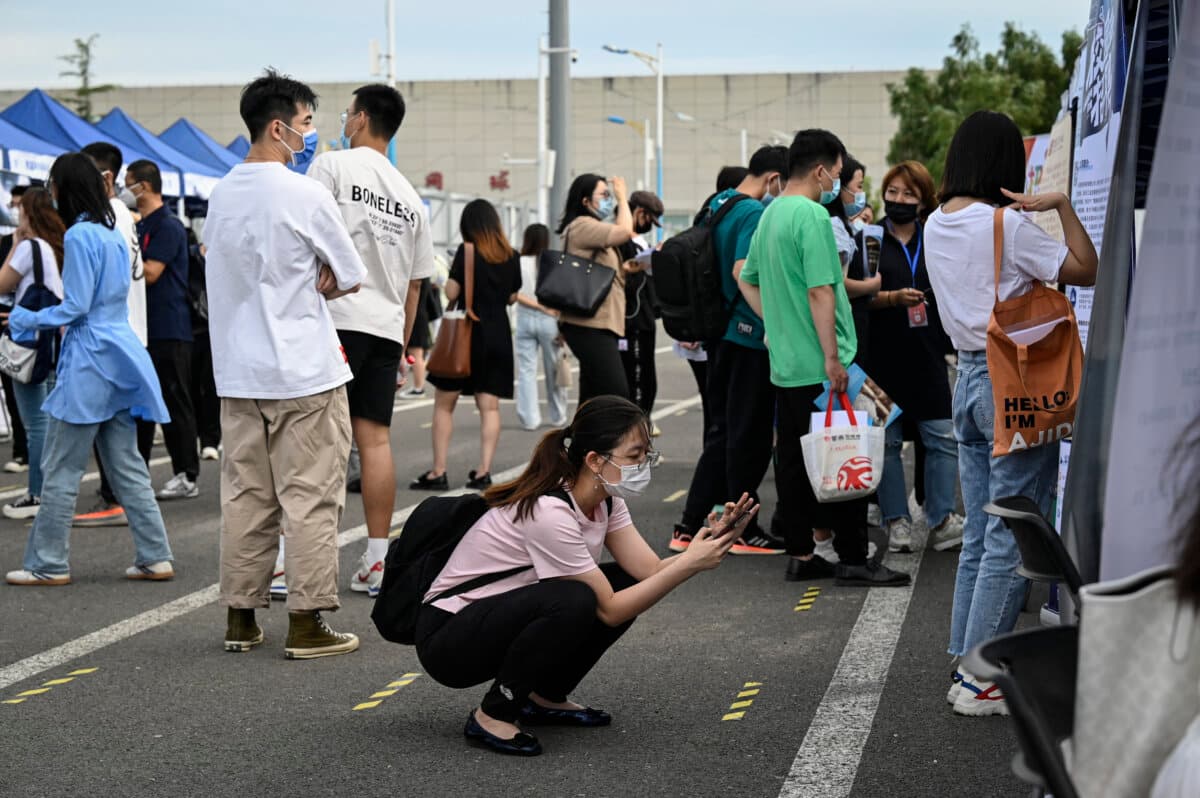 A job fair in Beijing on Aug. 26, 2022. China's slowing economy has left millions of young people fiercely competing for an ever-slimmer raft of jobs and facing an increasingly uncertain future. (Jade Gao/AFP via Getty Images)