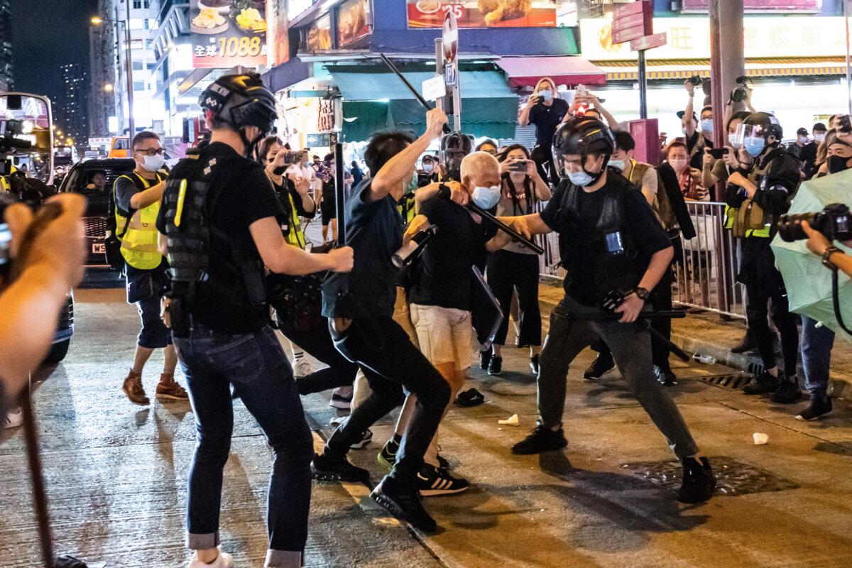 Undercover police arrest attendees during a memorial vigil in Hong Kong on June 4, 2020. (Billy H.C. Kwok/Getty Images)