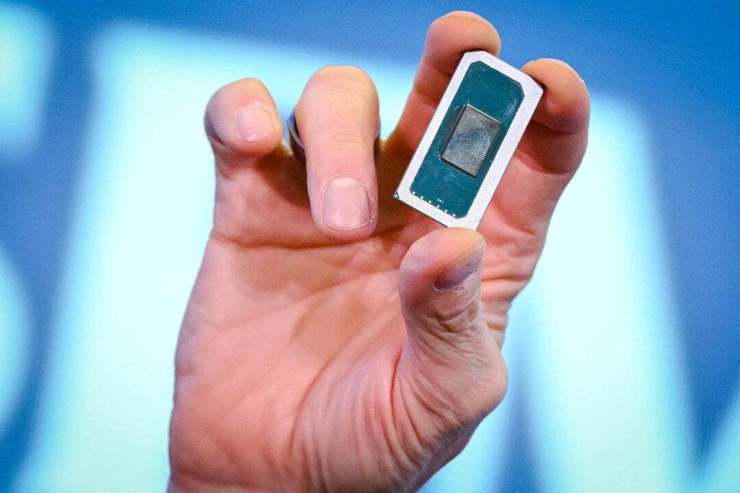 Intel CEO Pat Gelsinger holds the “Gaudi 3” AI chip as he speaks at The Semafor 2024 World Economy Summit in Washington on April 17, 2024. (Mandel Ngan/AFP via Getty Images)