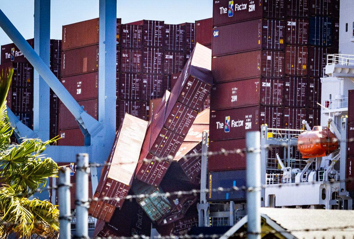 Collapsed shipping containers lay scattered along Pier G in the Port of Long Beach, Calif., on Sep. 9, 2025. (John Fredricks/The Epoch Times)