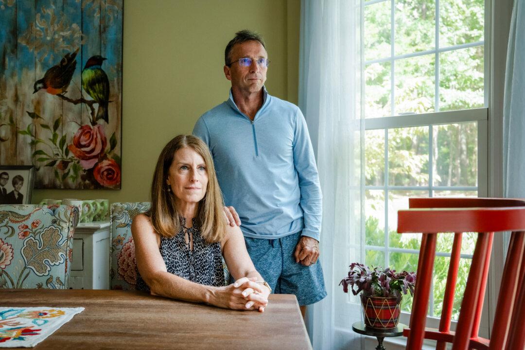 Dean Francis and his wife, Sarah, talk about their son's experience with kratom, at their home in Midlothian, Va., on Aug. 12, 2025. (Madalina Kilroy/The Epoch Times)