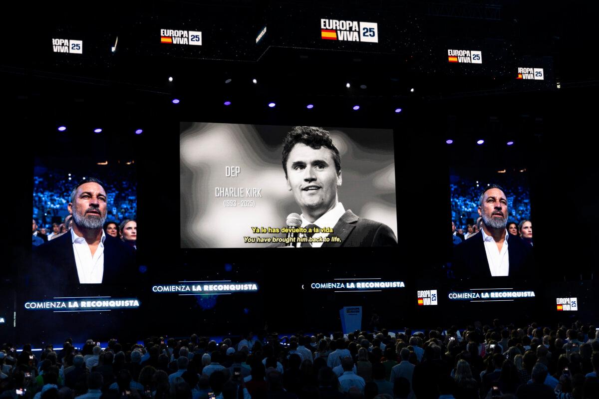 Santiago Abascal, leader of Spanish VOX party is seen on the screens of the stage as an image shows Charlie Kirk (C), who was assassinated four days before, at the start of a Patriots for Europe rally at Palacio de Vistalegre in Madrid, Spain, on Sept. 14, 2025. (Pablo Blazquez Dominguez/Getty Images)