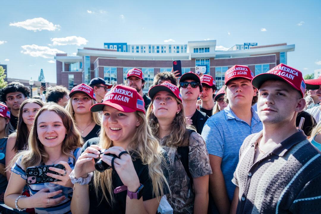 Attendees listen to Charlie Kirk, conservative political commentator and founder of Turning Point USA, during his You're Being Brainwashed Tour at the University of Nevada in Reno, Nev., on Oct. 8, 2024. (Andri Tambunan/AFP via Getty Images)