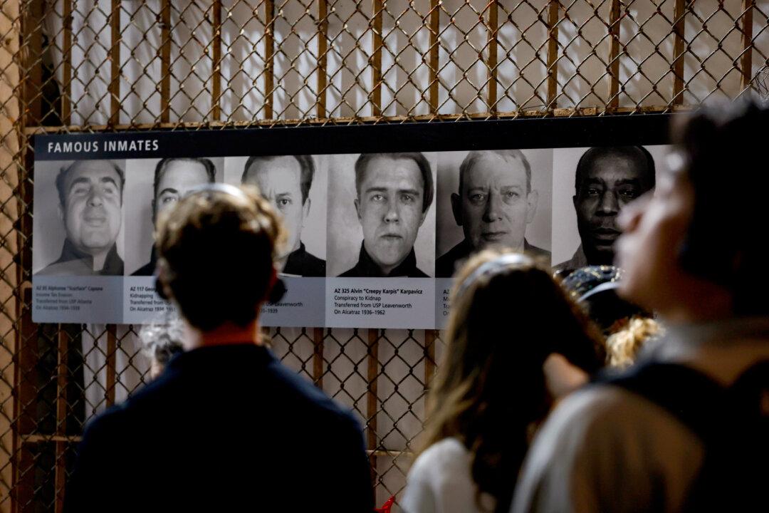 Visitors tour a cellblock at Alcatraz Island off San Francisco on July 2, 2025. Attorney General Pam Bondi and Secretary of the Interior Doug Burgum visited Alcatraz in June to explore the possibility of reopening the prison as a high-security facility. (Justin Sullivan/Getty Images)