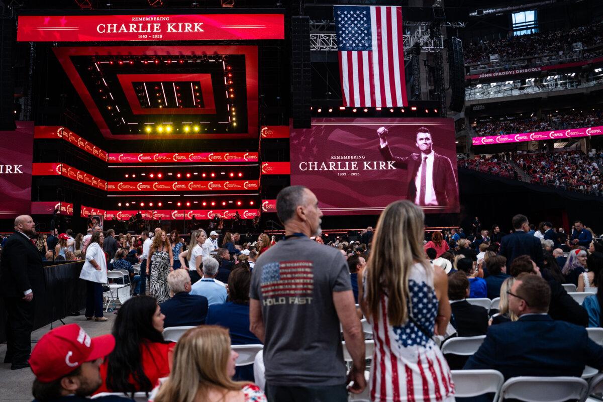 People take part in the Building a Legacy: Remembering Charlie Kirk Memorial event at the State Farm Stadium in Glendale, Ariz., on Sept. 21, 2025. (Madalina Kilroy/The Epoch Times)