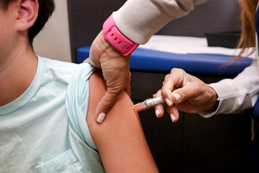 A child receives a standard immunization at a pediatric office in Coral Gables, Fla., on Sept. 15, 2025. The Florida Department of Health recently released information on the development of rulemaking to revise immunization and document requirements for school entry. (Joe Raedle/Getty Images)