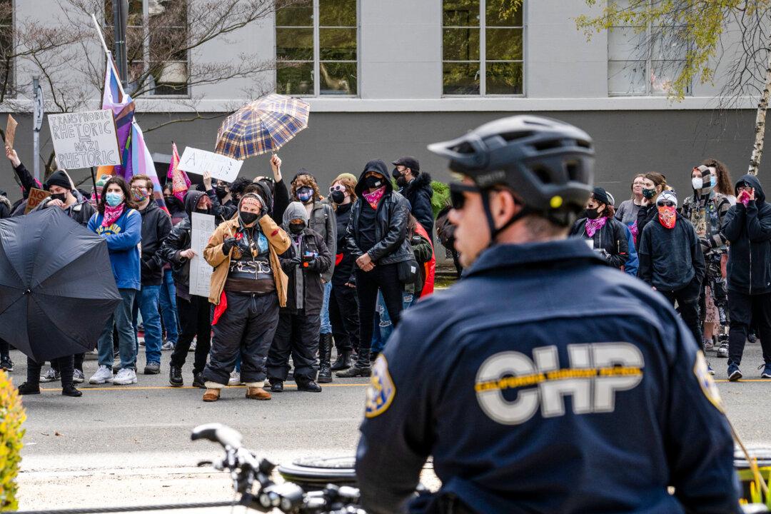 Antifa activists gather in Sacramento, Calif., on March 10, 2023. Observers say far-left groups are recruiting transgender individuals and using identity groups to sow division among Americans. (John Fredricks/The Epoch Times)
