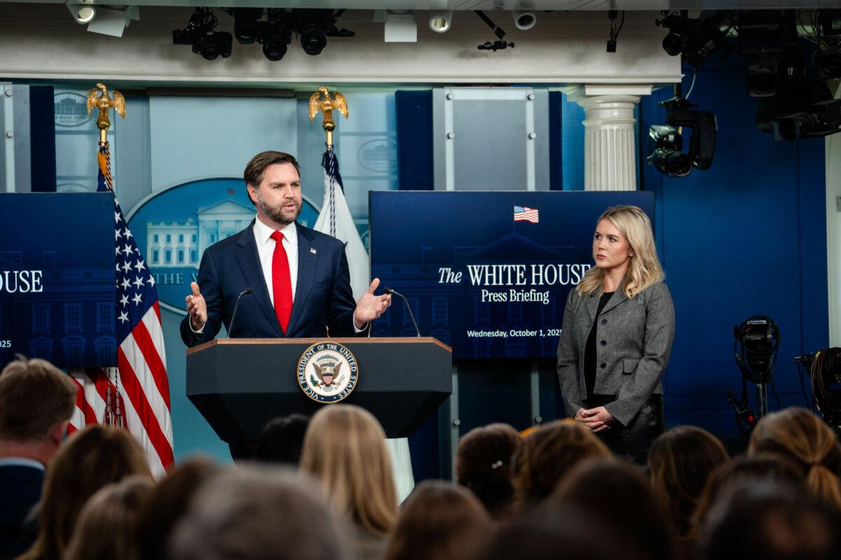 Vice President JD Vance and White House press secretary Karoline Leavitt during a press briefing at the White House on Oct. 1, 2025. (Madalina Kilroy/The Epoch Times)