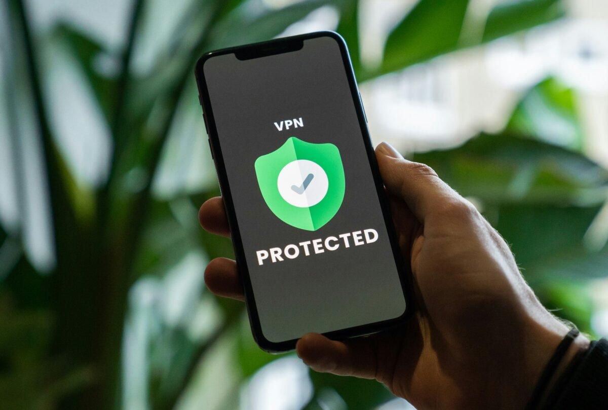 In this photo illustration, iPhone with VPN service enabled in hand, on Oct. 29, 2020. (Privecstasy/Unsplash)