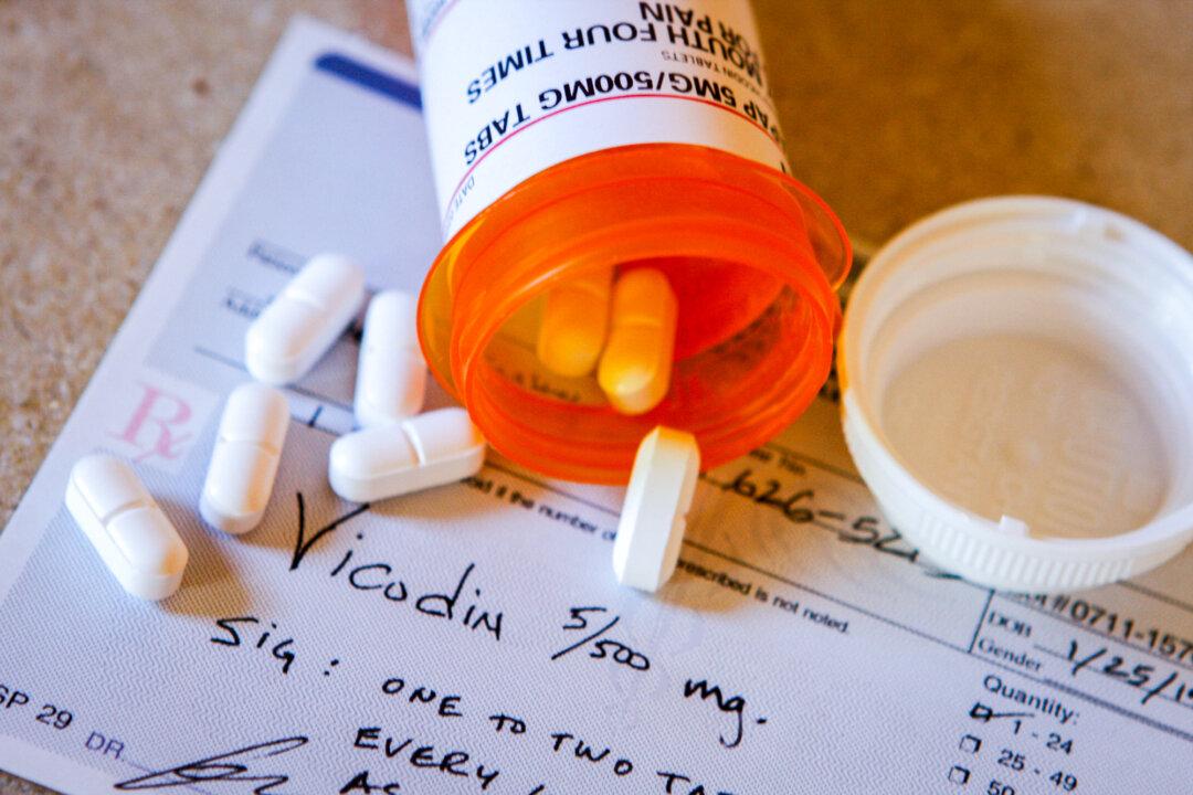 Vicodin medication on a prescription form at a doctor's office in California on Dec. 13, 2012. Patients in the United States pay higher drug prices than those in any other country, and prices for new medications are often the most expensive. (Maria Daly Centurion/The Epoch Times)