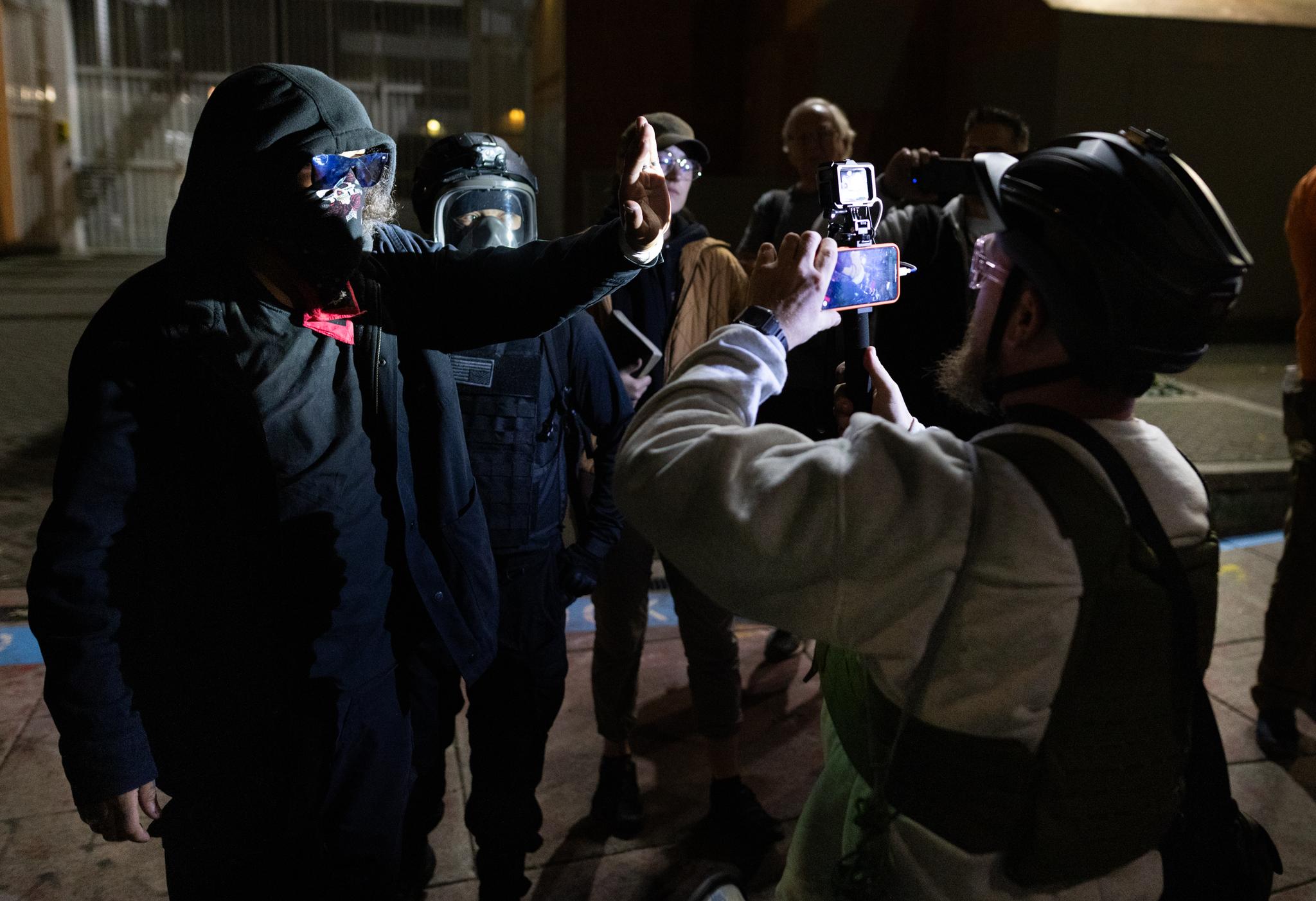 Protesters argue in front of Immigration and Customs Enforcement offices in Portland, Ore., on Oct. 3, 2025. (John Fredricks/The Epoch Times)