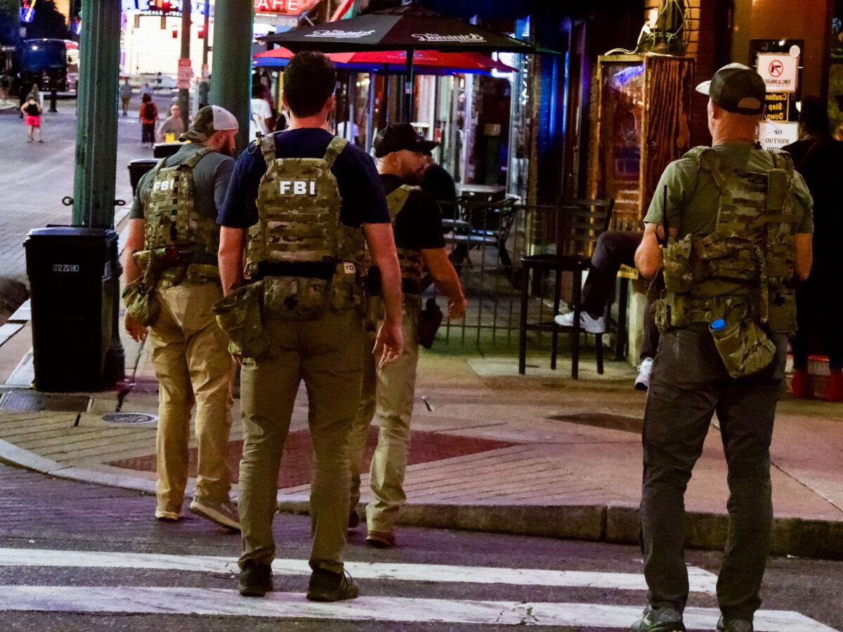 FBI agents patrol Beale Street in Memphis, Tenn., on Oct. 5, 2025. (Travis Gillmore/The Epoch Times)