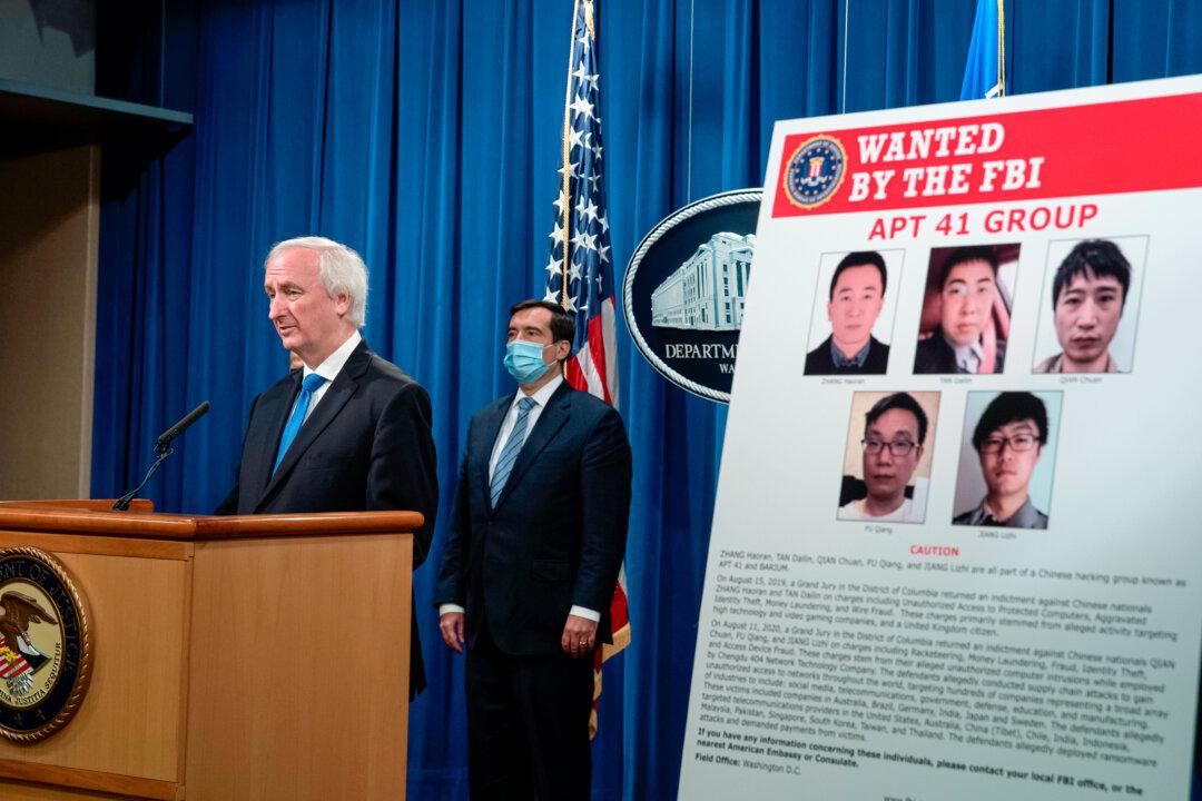 U.S. Deputy Attorney General Jeffery A. Rosen talks about charges and arrests related to a hacking campaign tied to the Chinese regime, at the Justice Department in Washington on Sept. 16, 2020. (Tasos Katopodis/AFP via Getty Images)