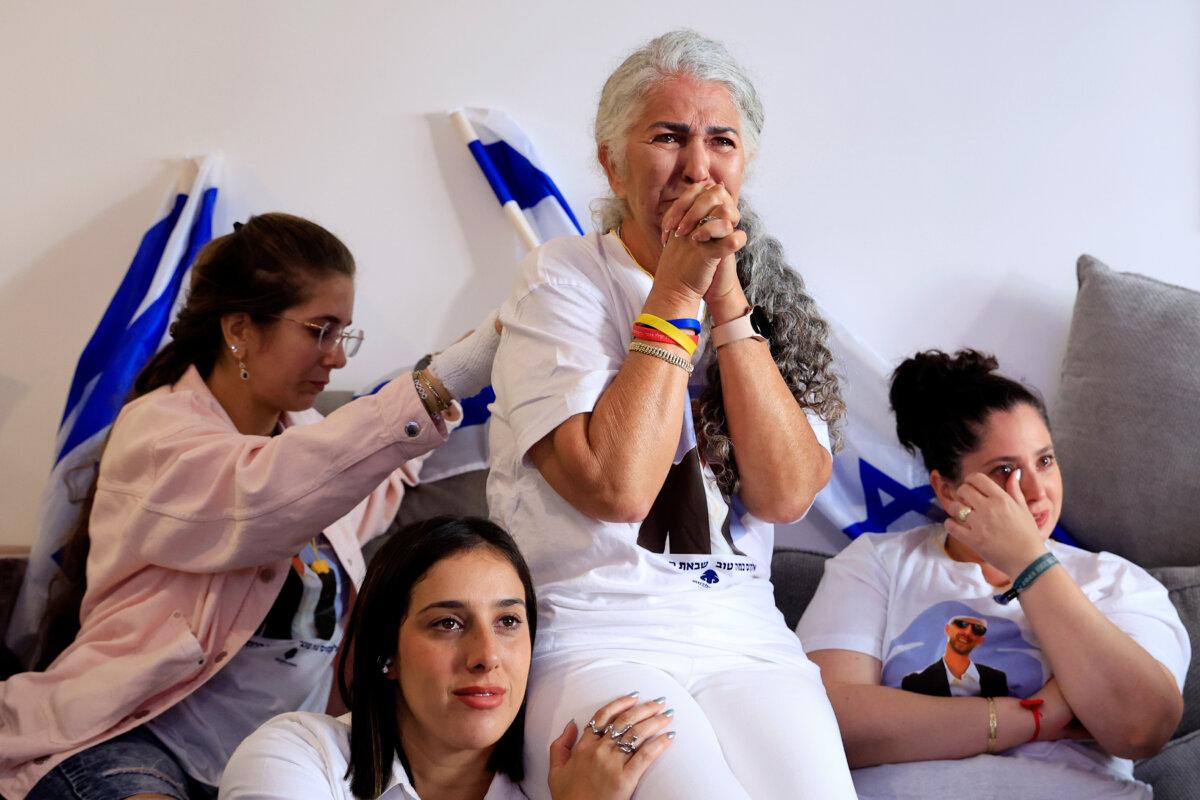 Families and friends of Gaza hostage Elkana Bohbot react as they watch the hostage release live stream from the home of Bohbot's mother in Mevaseret Zion in Tel Aviv, Israel, on Oct. 13, 2025. (Amir Levy/Getty Images)