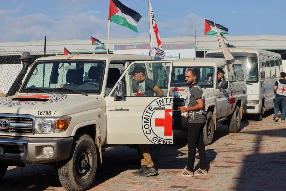 International Red Cross vehicles move towards the eastern Gaza Strip from Khan Yunis on Oct. 13, 2025. (ABDELRAHMAN RASHAD/Middle East Images/AFP via Getty Images)