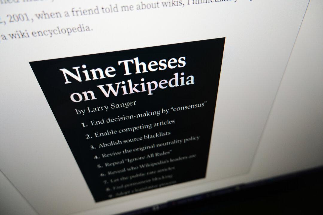 A computer screen shows Larry Sanger’s website on Oct. 16, 2025. Sanger said the way Wikipedia is organized creates a self-perpetuating cycle that he described as an “irrational bureaucracy.” (Oleksii Pydsosonnii/The Epoch Times)