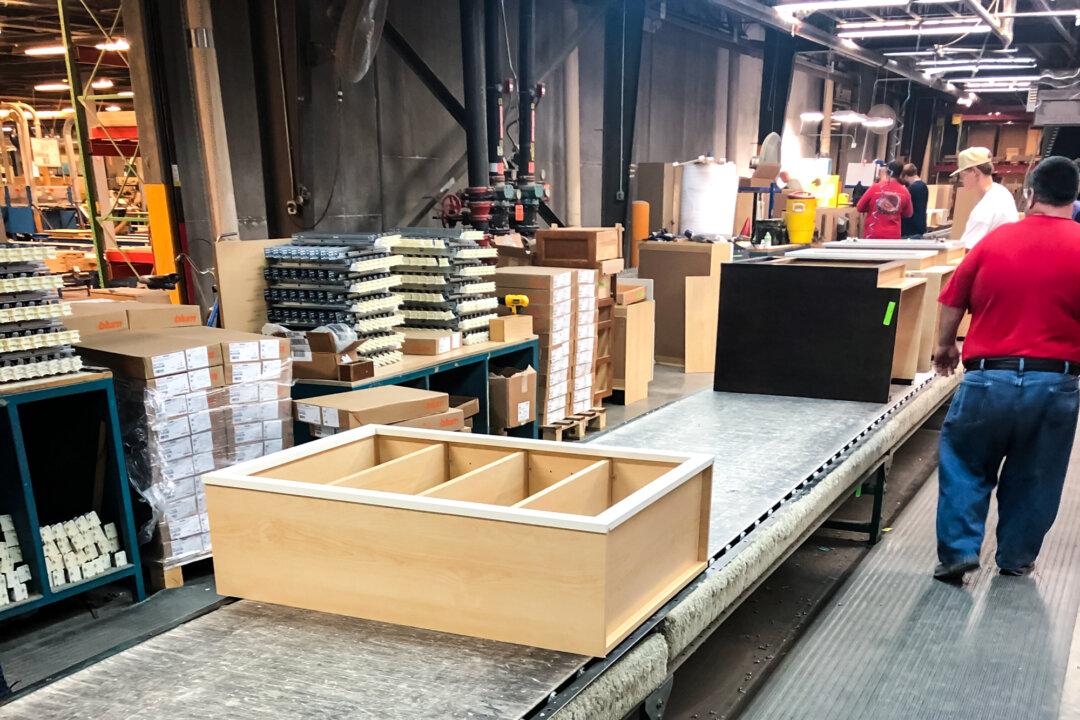 The assembly line at Wellborn Cabinet’s headquarters in Ashland, Ala., in 2024. A flood of imports cut demand for U.S.-made cabinets, forcing the company to freeze hiring. (Courtesy of Wellborn Cabinet)