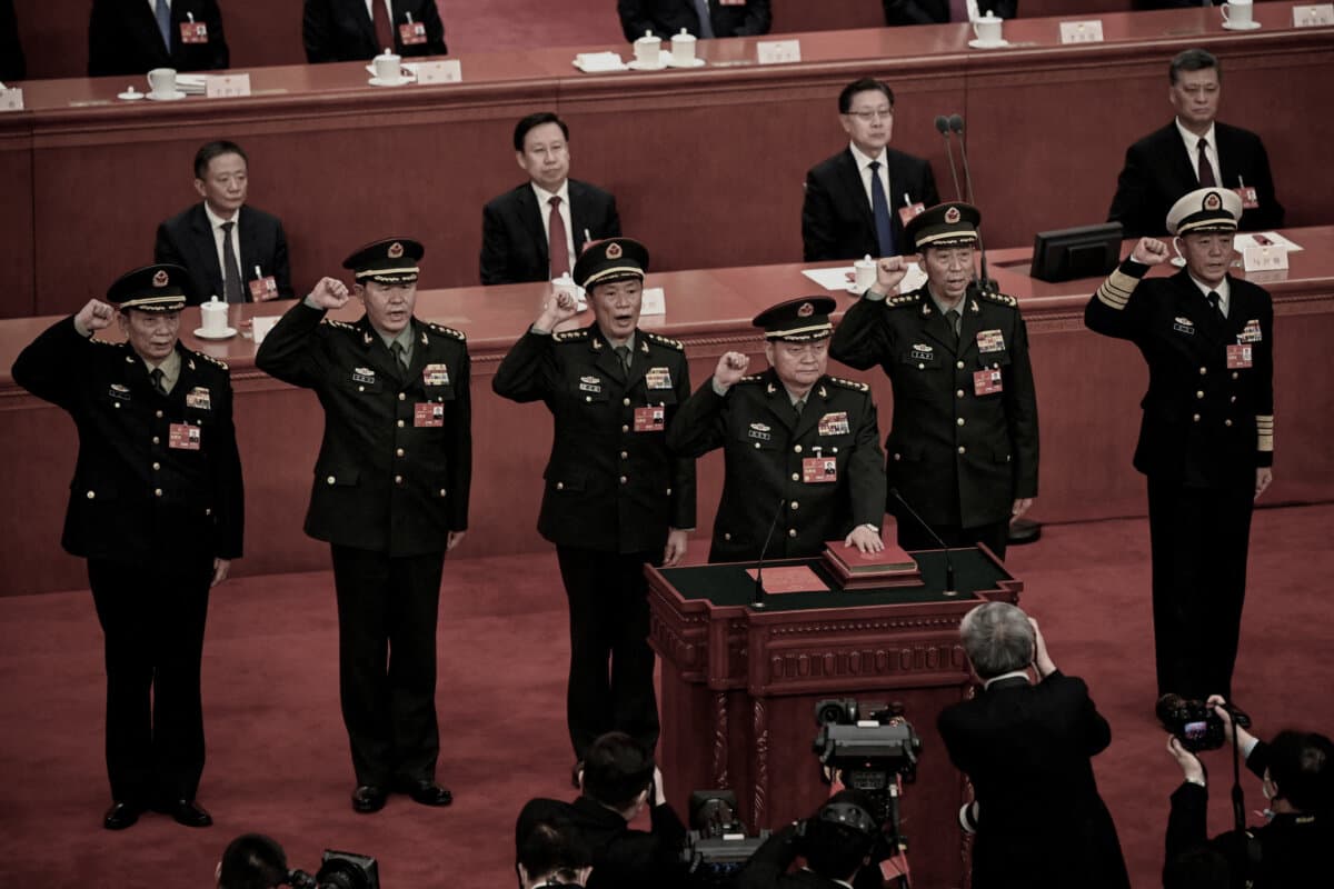 Zhang Youxia (front), newly-elected Vice Chairman of the Central Military Commission of the People's Republic of China, swears an oath with members of the Central Military Commission (L-R) Zhang Shengmin, Liu Zhenli, He Weidong, Li Shangfu, and Miao Hua, after they were elected during the fourth plenary session of the National People's Congress at the Great Hall of the People in Beijing on March 11, 2023. (Greg Baker/Pool via Reuters)