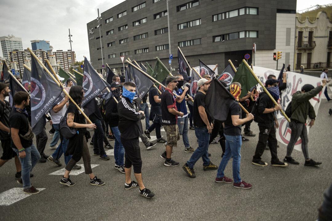 Protesters march during an anti-fascism demonstration in Barcelona on Oct. 12, 2017. (Jorge Guerrero/AFP via Getty Images)
