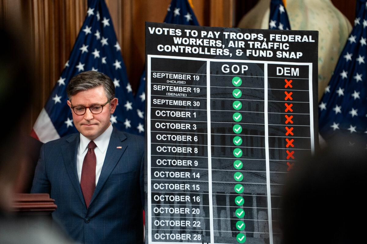 House Speaker Mike Johnson (R-La.) listens during a press conference on the 29th day of the government shutdown in Washington on Oct. 29, 2025. (Madalina Kilroy/The Epoch Times)