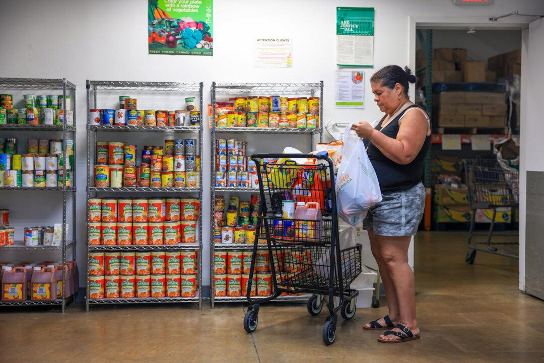 A woman shops at the Feeding South Florida food pantry in Pembroke Park, Fla., on Oct. 27, 2025. The USDA announced that SNAP benefits will not be issued if the shutdown continues past Nov. 1. (Joe Raedle/Getty Images)