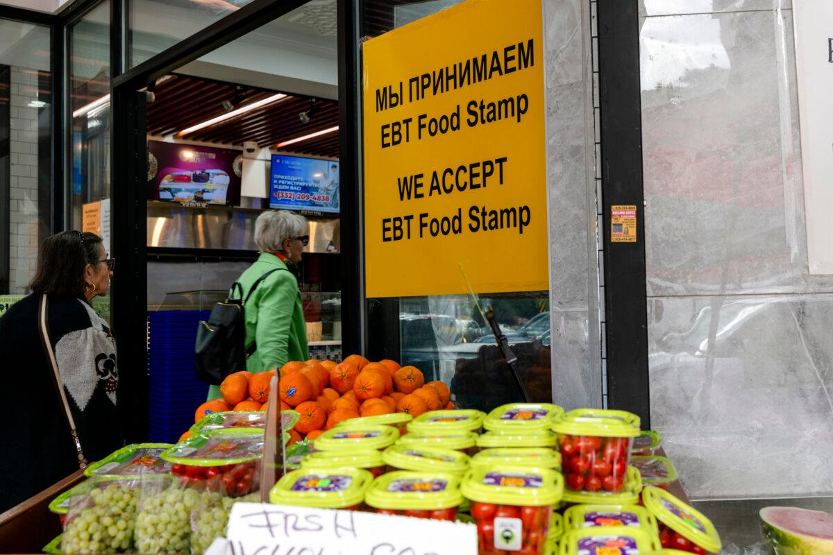 People shop for food at a store that accepts food stamps in New York City, in an undated file photograph. (Spencer Platt/Getty Images)