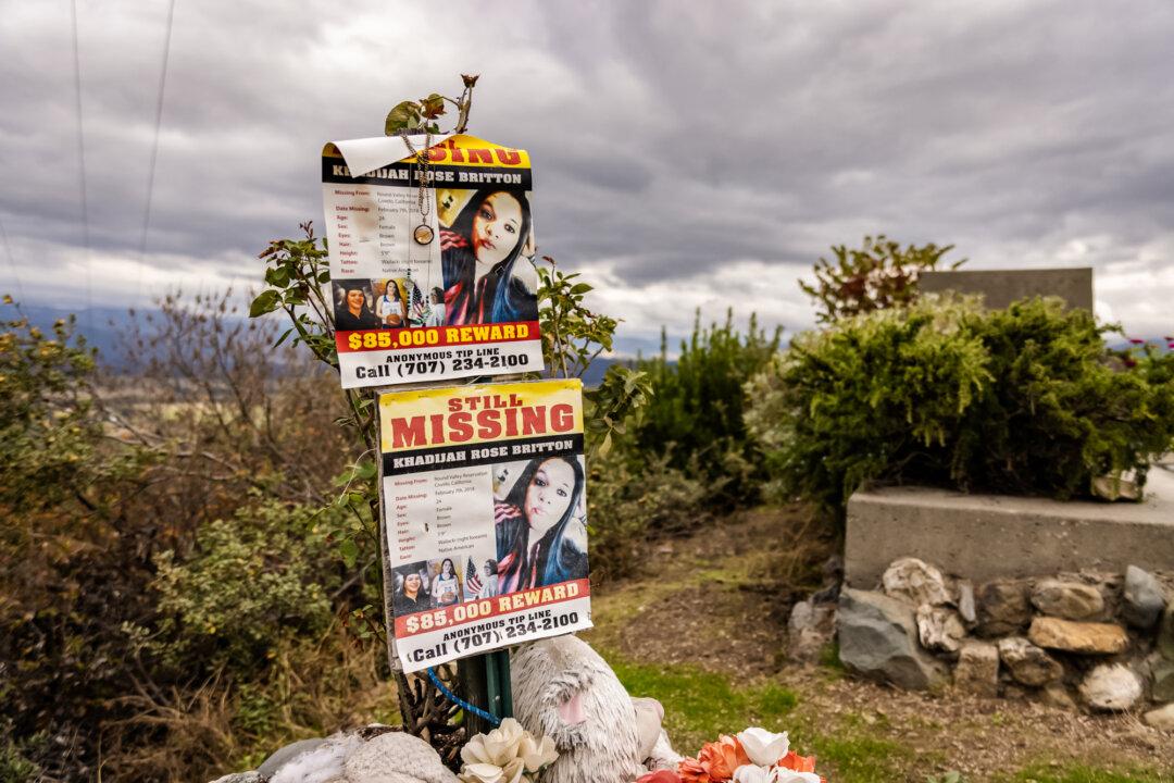 Signs are displayed for a missing woman outside of Covelo, Calif., on Oct. 9, 2025. (John Fredricks/The Epoch Times)