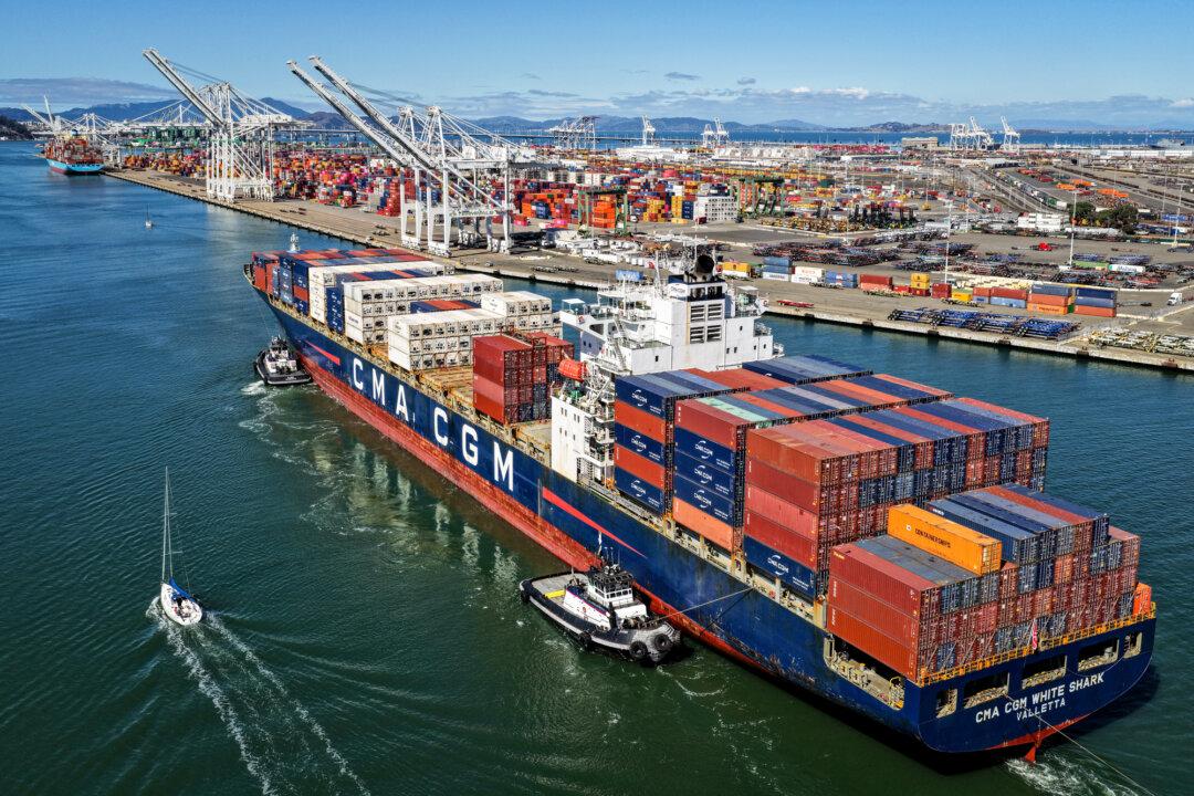 A container ship arrives at the Port of Oakland in Oakland, Calif., on Oct. 10, 2025. Multiple federal courts—including the U.S. Court of International Trade and the U.S. District Court for the District of Columbia—have ruled Trump’s tariffs unlawful, but delayed enforcement of their orders blocking them. (Justin Sullivan/Getty Images)