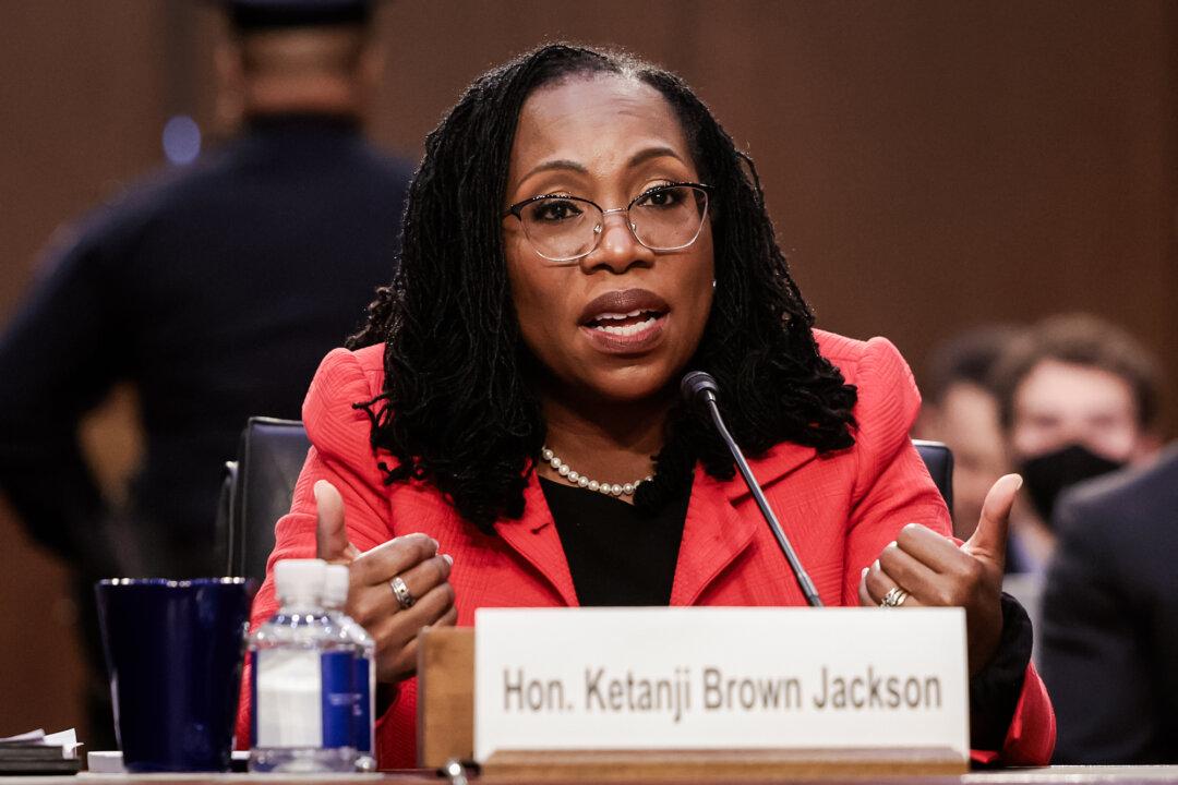 (Left) Supreme Court nominee Judge Ketanji Brown Jackson testifies during her confirmation hearing in Washington on March 22, 2022. (Right) Supreme Court nominee Judge Amy Coney Barrett testifies during her confirmation hearing in Washington on Oct. 13, 2020. (Anna Moneymaker/Getty Images, Kevin Dietsch/Pool/Getty Images)