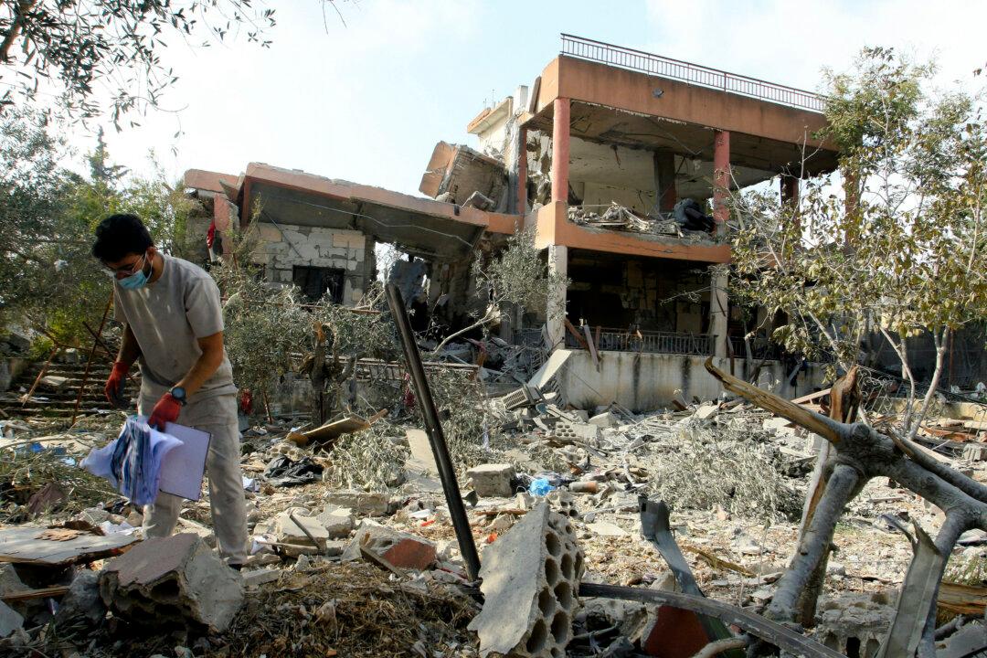 A man inspects a site targeted overnight by an Israeli airstrike in the southern Lebanese village of Kfar Dounine, Lebanon, on Nov. 7, 2025. Israel said it struck a series of Hezbollah targets in southern Lebanon on Nov. 6, with Lebanon's President Joseph Aoun denouncing the new attacks and accusing Israel of rejecting Beirut's overtures towards diplomacy. (Mahmoud Zayyat/AFP via Getty Images)