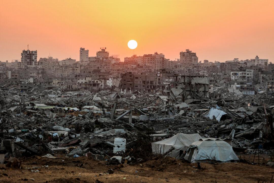 The sun sets over a heavily damaged area of Jabalia, in the northern Gaza Strip, on Nov. 7, 2025. (Omar Al-Quattaa/AFP via Getty Images)