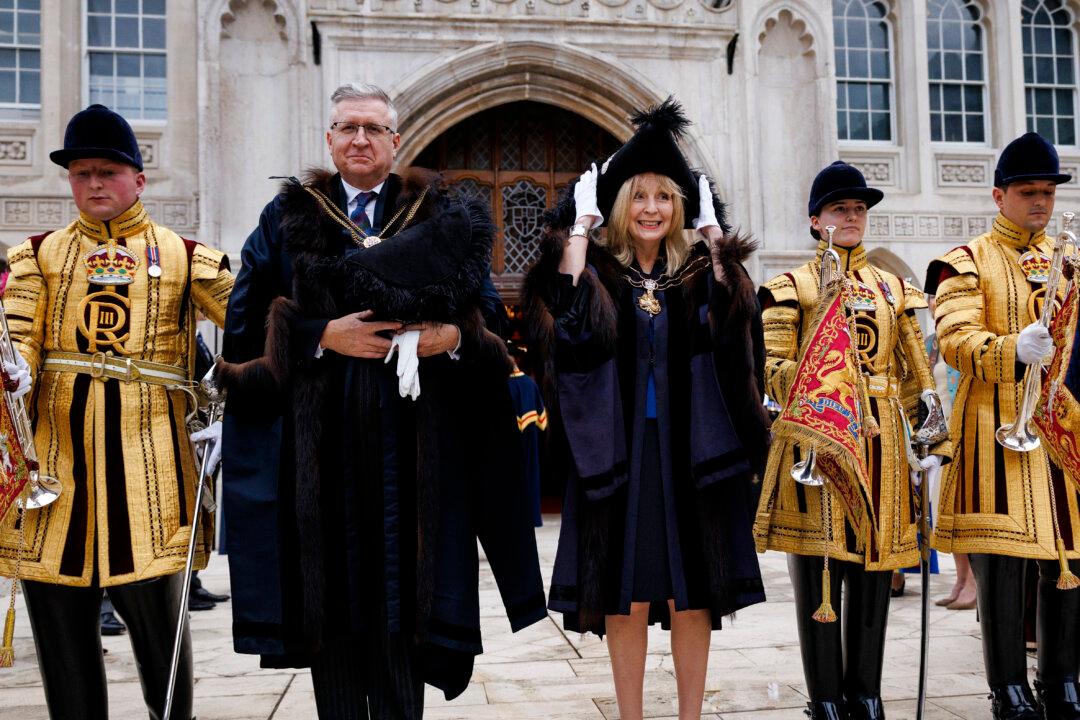 Lady Mayor Dame Susan Langley walks into the courtyard of the Guildhall after becoming the 697th holder of the position during a “silent ceremony” in London, on Nov. 7, 2025. Alderwoman Langley DBE succeeded Alderman Alastair King as the third woman to hold the office and the first to take the title of “Lady Mayor.” During the ceremony no words are spoken, apart from a short declaration of office by the incoming Lady Mayor. (Dan Kitwood/Getty Images)