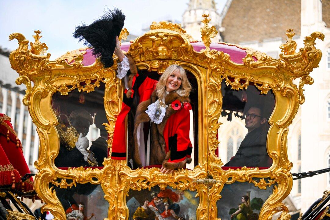 Dame Susan Langley DBE arrives at the State Coach, built in 1757, in London, England, on Nov. 8, 2025. (Ben Montgomery/Getty Images)