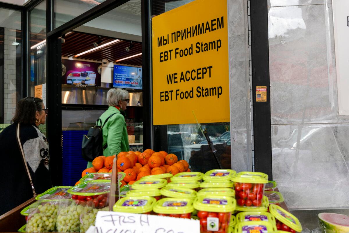 People shop for food at a store that accepts food stamps in New York City, in an undated file photograph. (Spencer Platt/Getty Images)