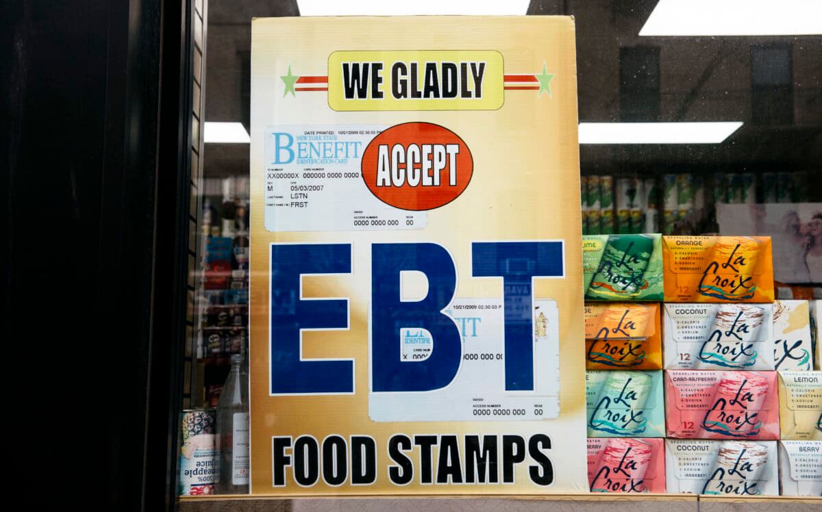 A sign alerting customers about SNAP benefits is displayed at a grocery store in New York City on Dec. 5, 2019. (Scott Heins/Getty Images)