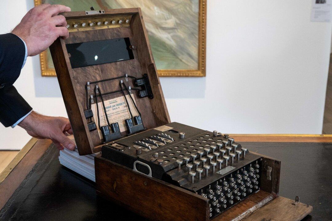 An Enigma M4 rotor key machine used for encrypted communication during World War II, is on exhibit ahead of its auction at the Christie's auction house in Paris, on Nov. 13, 2025. (Bertrand Guay/AFP via Getty Images)