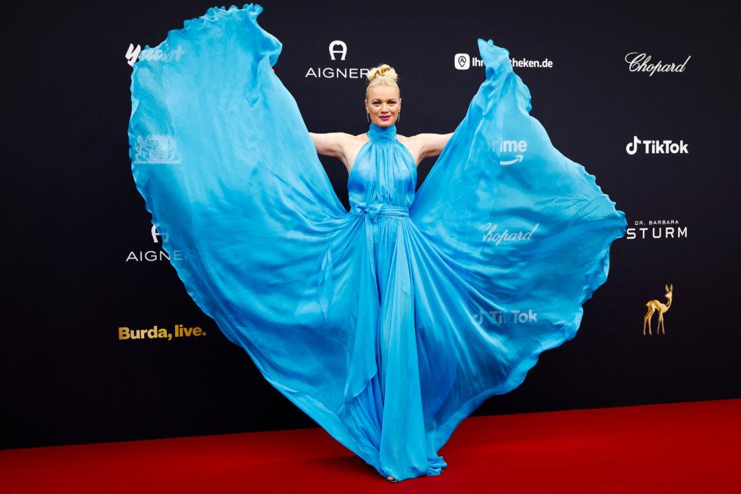 German model Franziska Knuppe arrives on the red carpet before attending the ceremony for the German media award Bambi in Munich, Germany, on Nov. 13, 2025. (Michaela Stache/AFP via Getty Images)