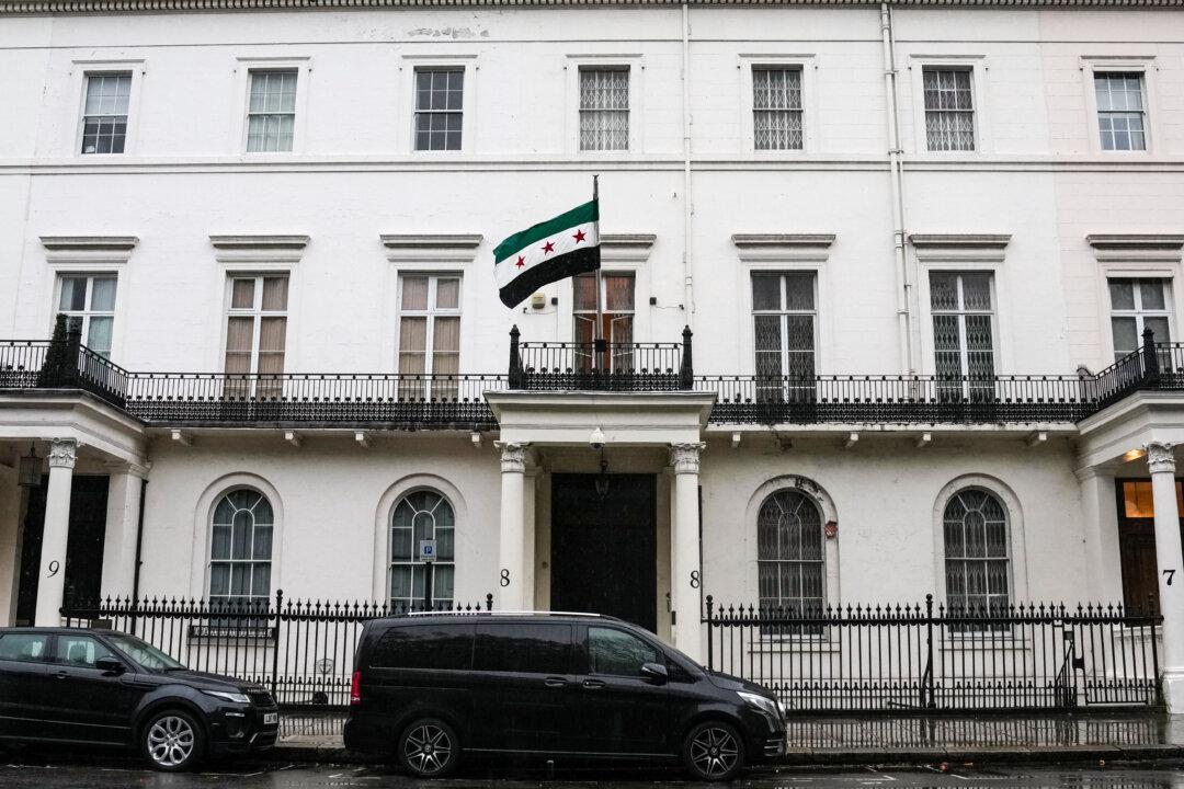 The Syrian flag flies outside the country’s embassy a day after the mission reopened, as the UK restored diplomatic ties, in London on Nov. 14, 2025. (Carlos Jasso/AFP via Getty Images)